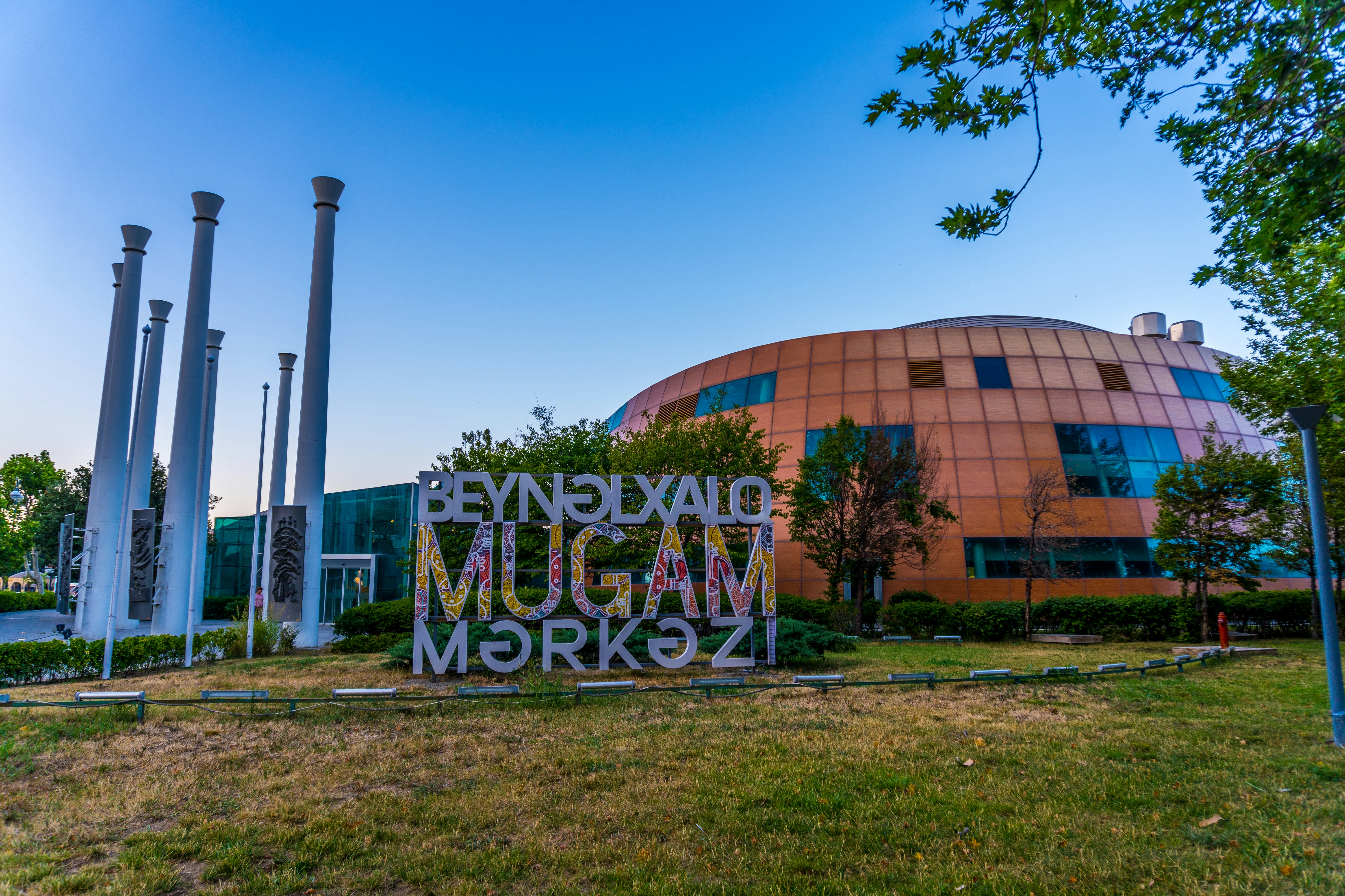 The mugam center is shown with its sign.