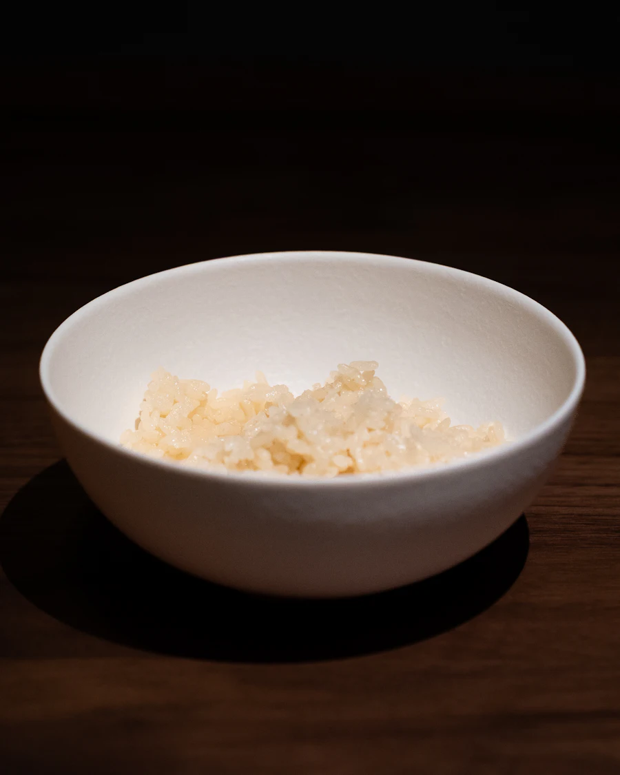 A rice bowl topped with vegetables