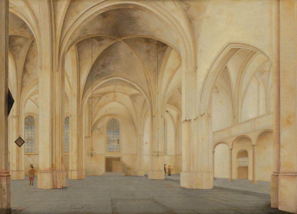 Large ornate church interior with high ceilings and arched windows in a white-painted space
