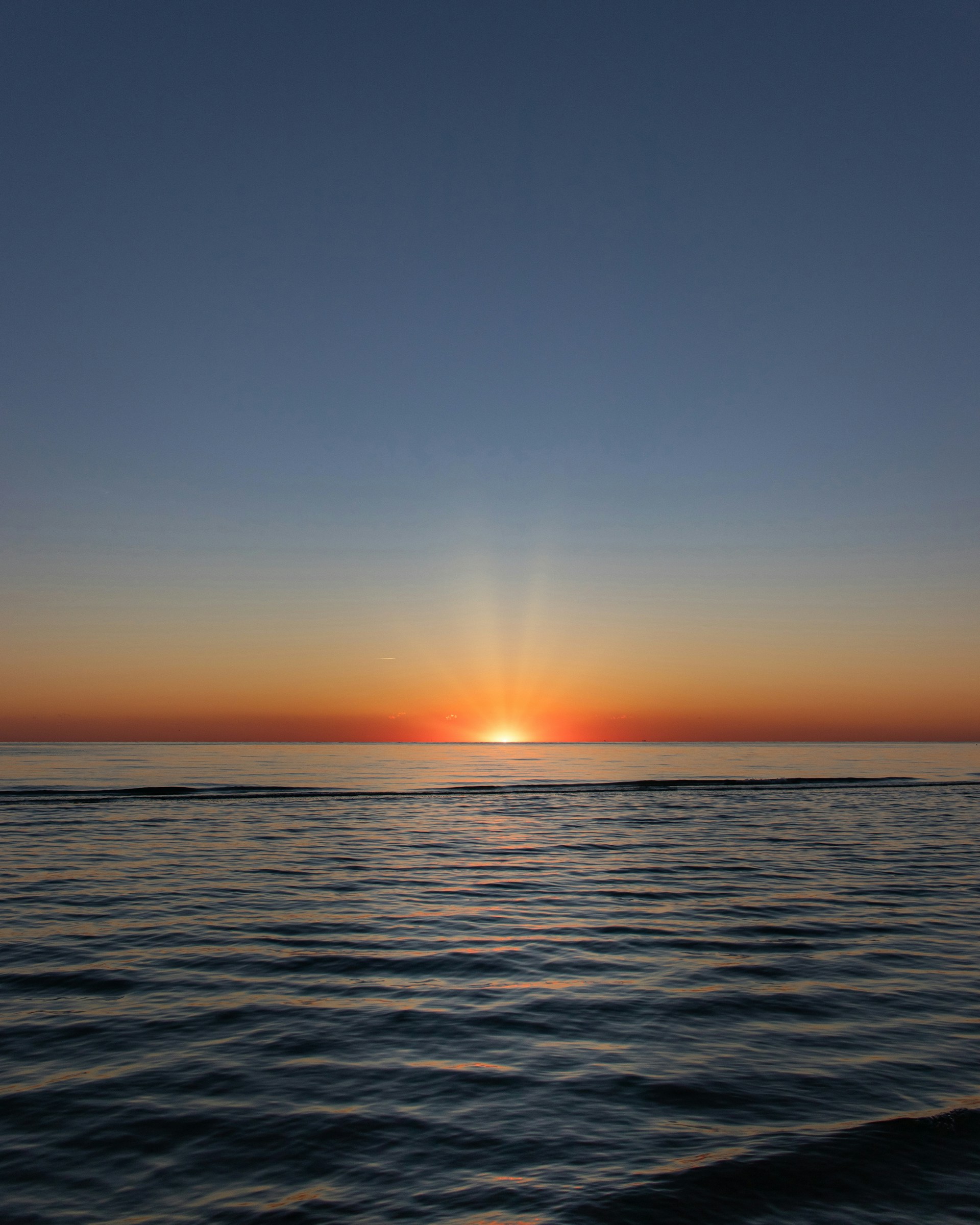 Ocean sunset with a beautiful sky.