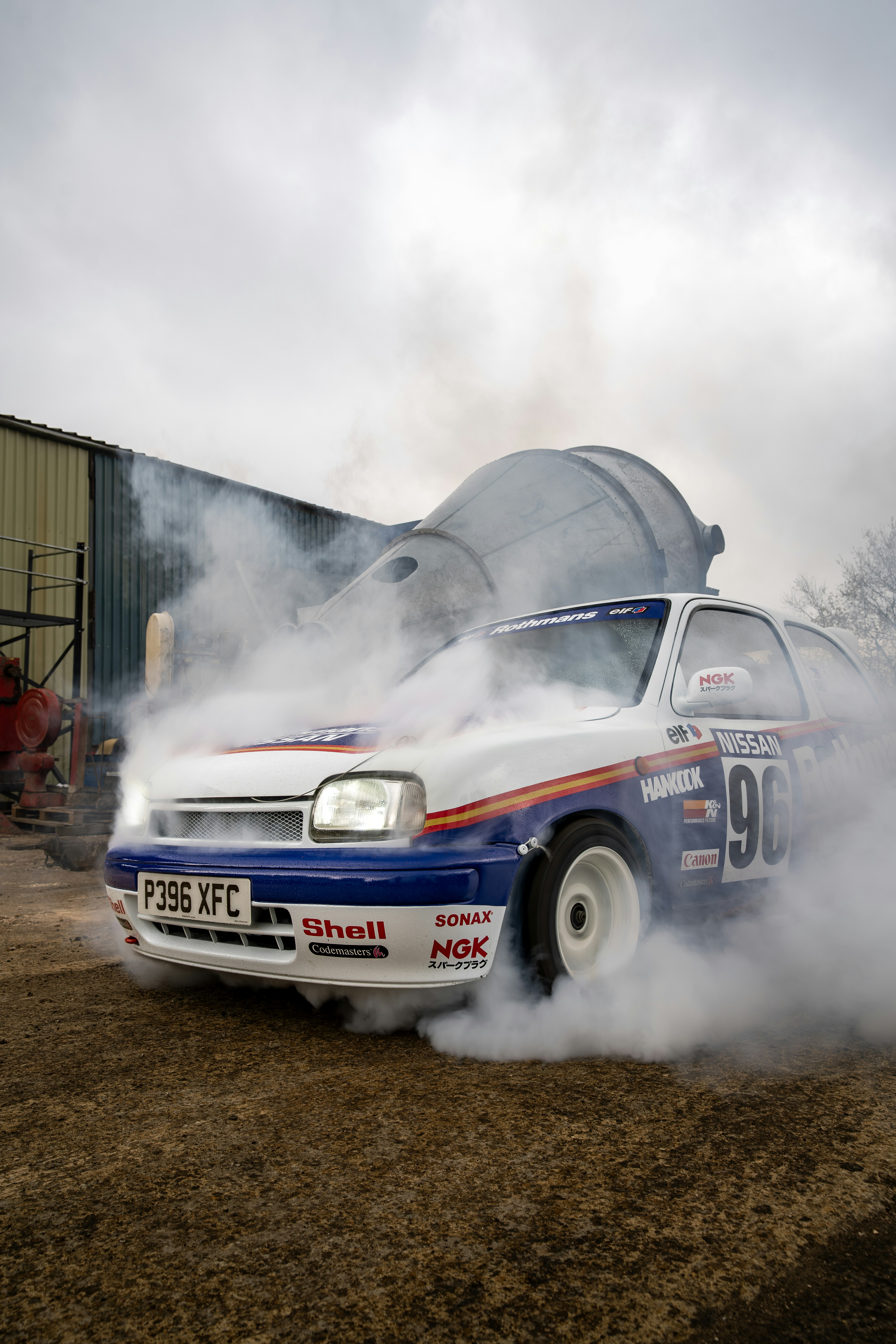 A race car does a burnout, creating smoke. photo – Free Jdm Image on ...
