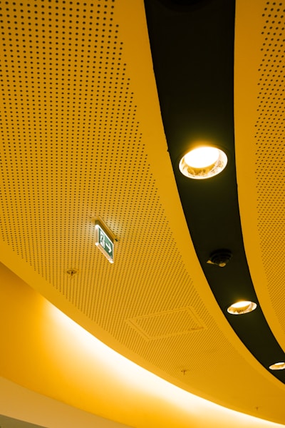 Recessed pot light installation in a modern home interior