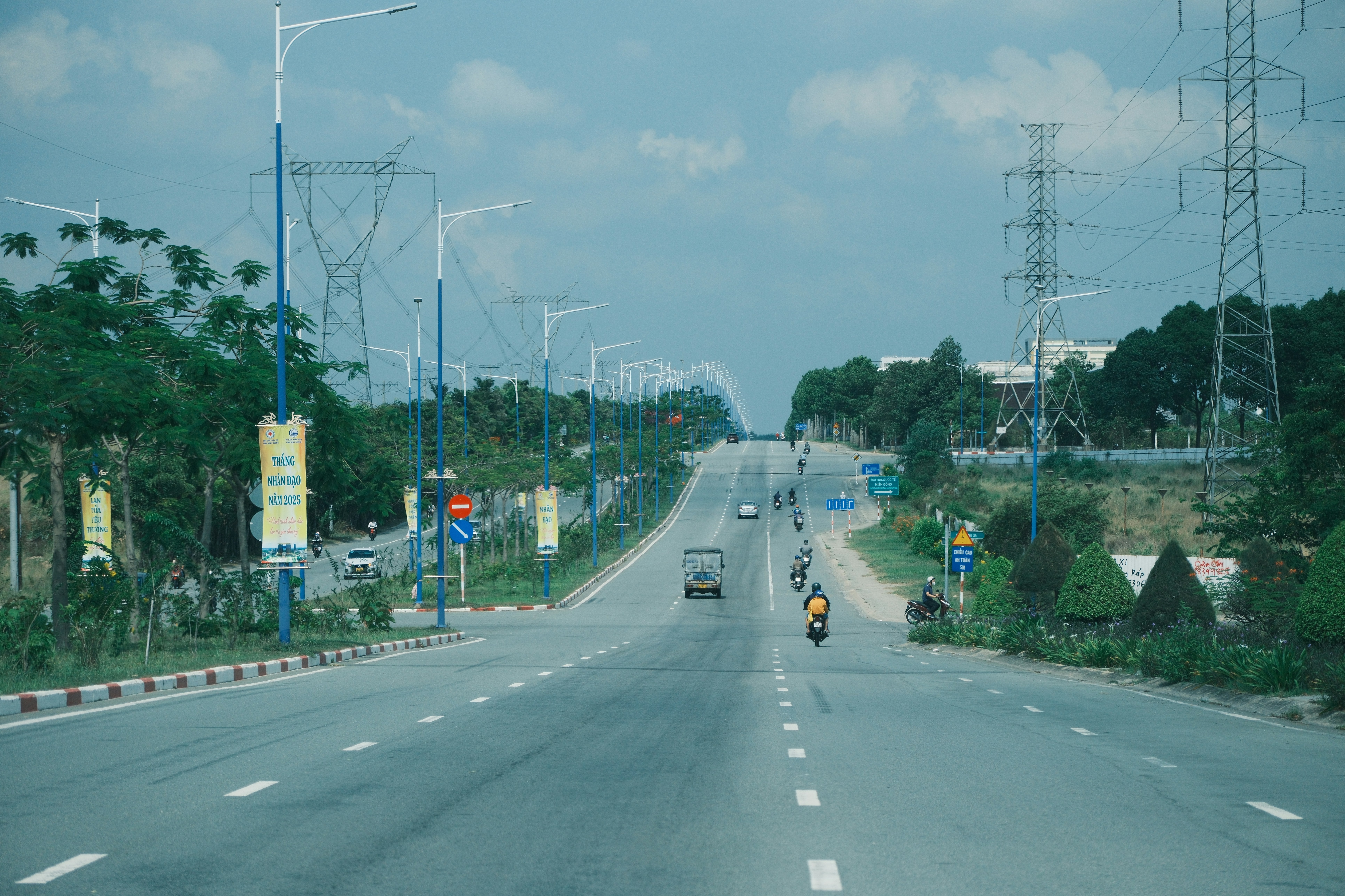 Family driving a modern electric SUV on a suburban road