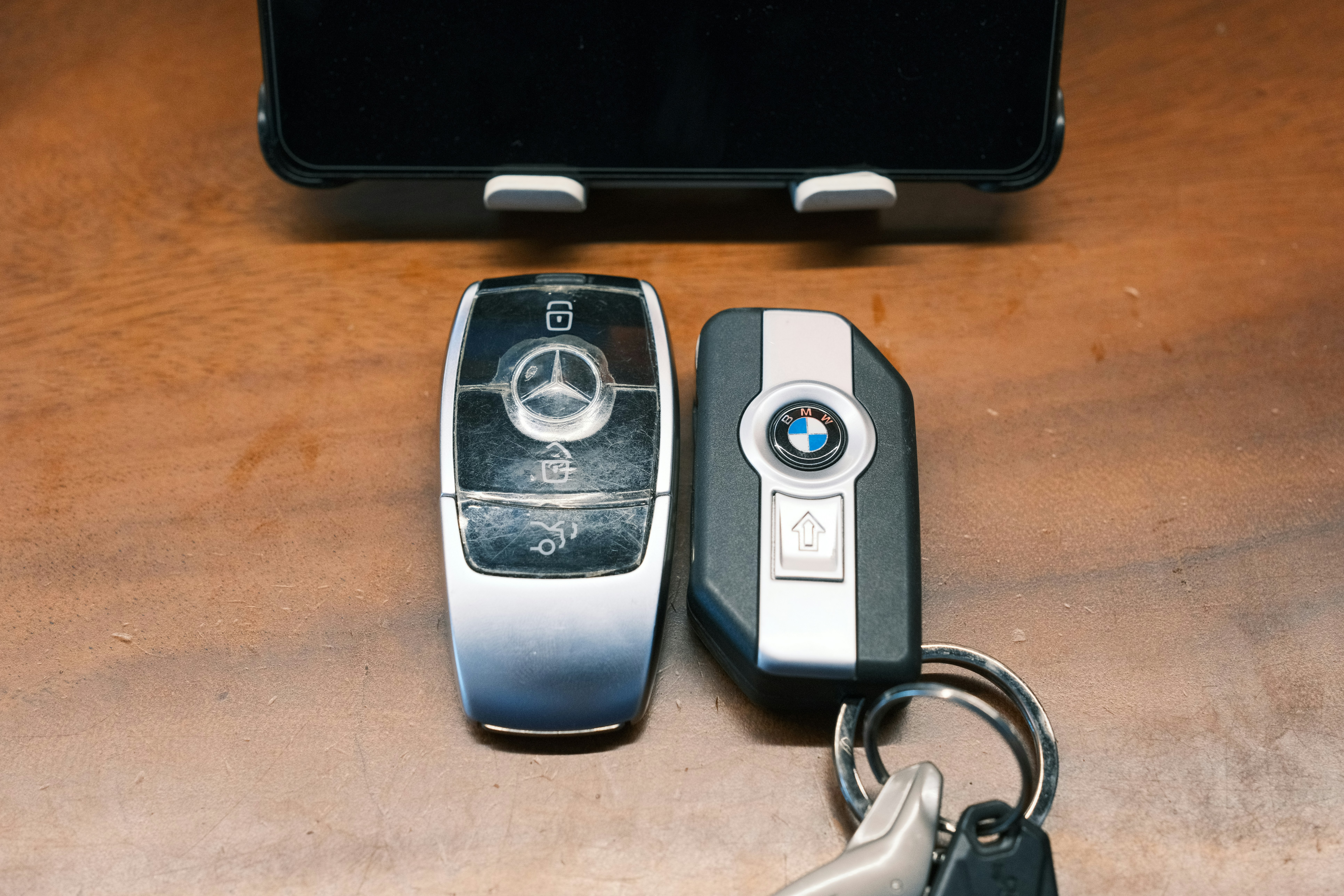 Technician reviewing electric vehicle battery health diagnostics on a tablet