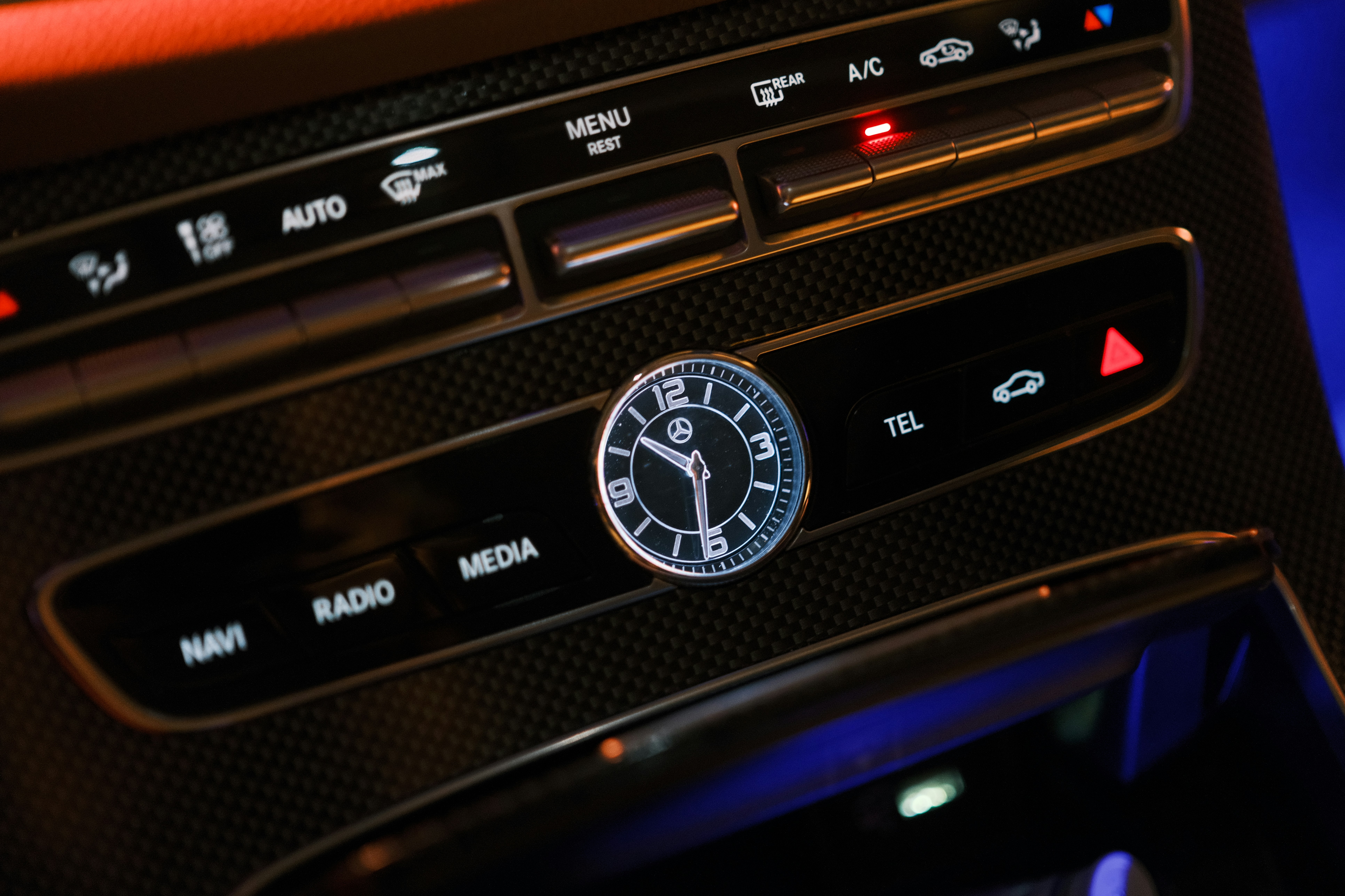 Car's dashboard clock and control panel are shown. photo – Free Car ...