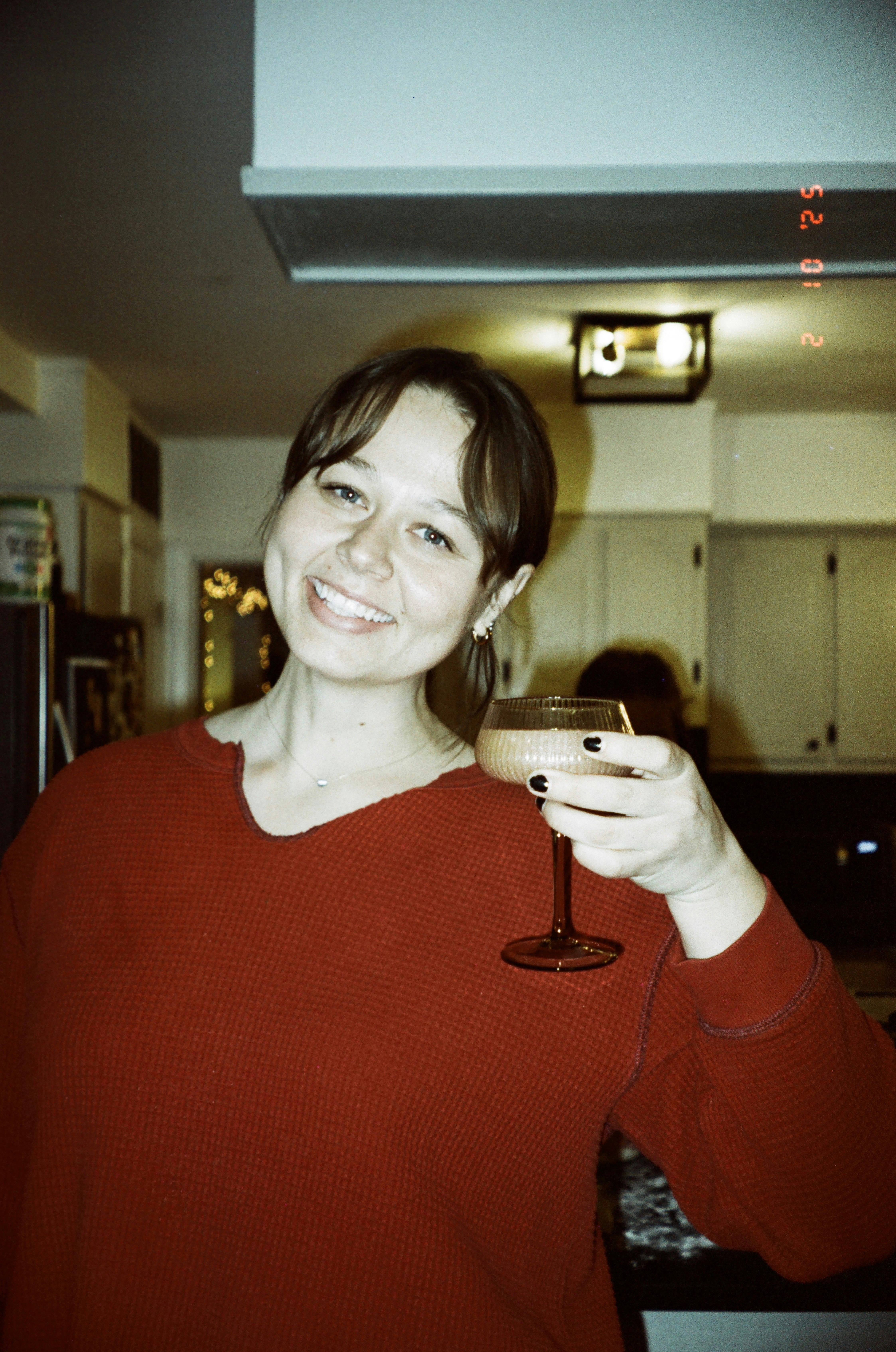 Professional headshot of a smiling woman in her 40s, homeowner.