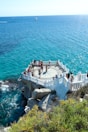 A scenic platform overlooks the beautiful blue ocean.