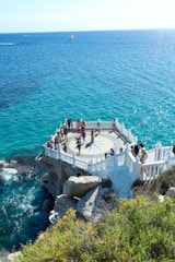 A scenic platform overlooks the beautiful blue ocean.