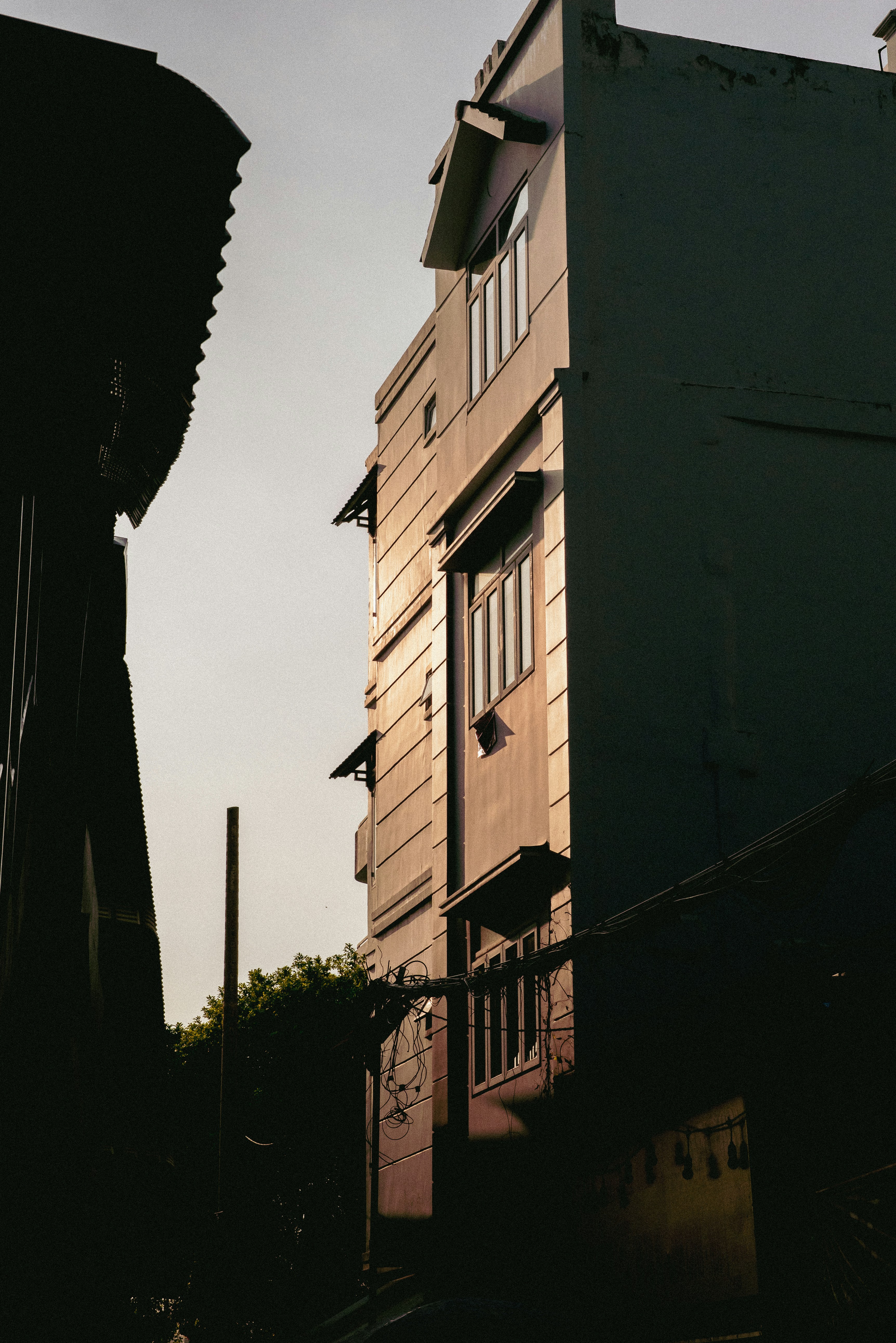 Buildings are highlighted by sunlight in this image.