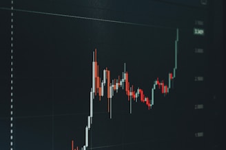 Stock market chart showing upward trend.