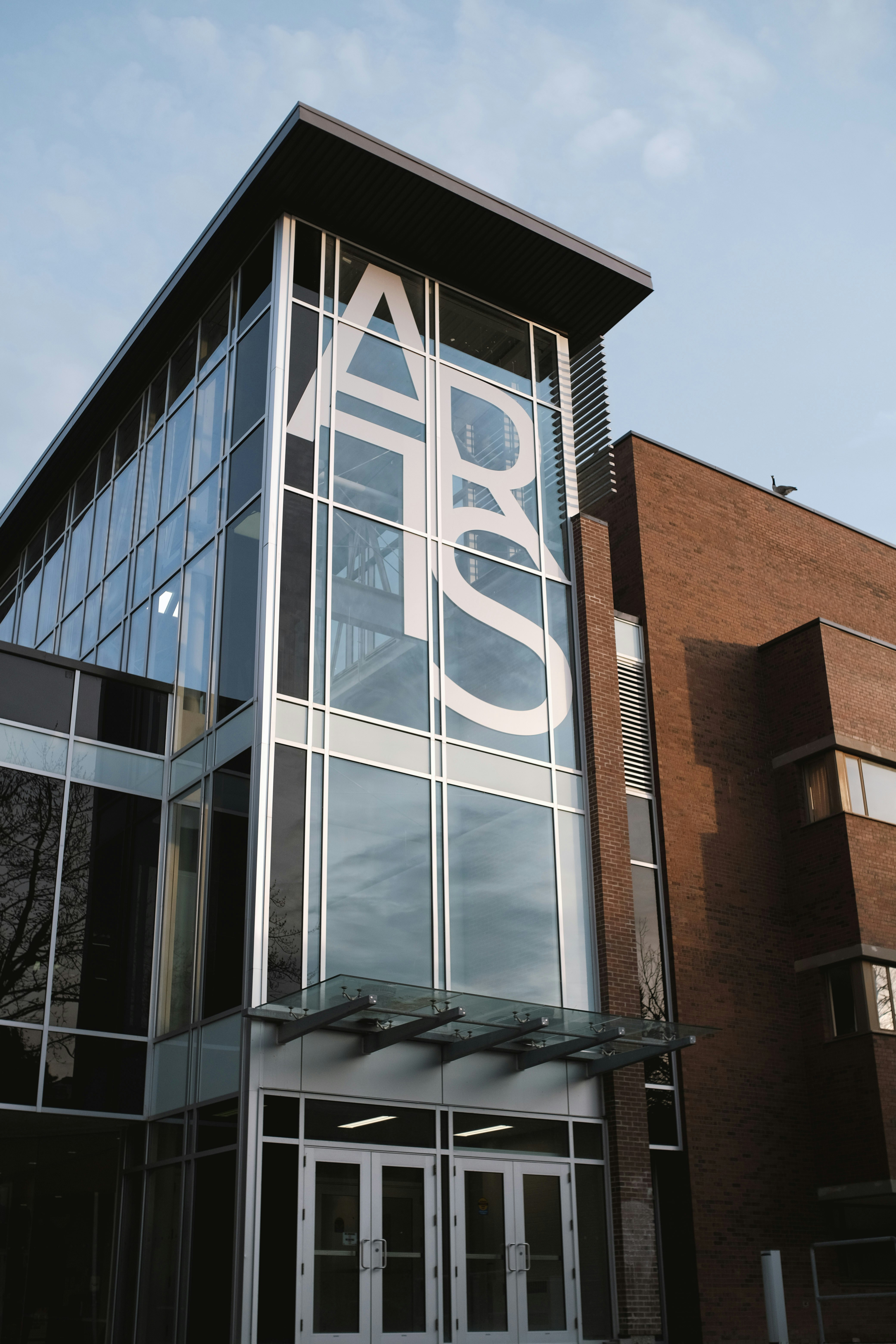 A building with "abs" visible on the facade.