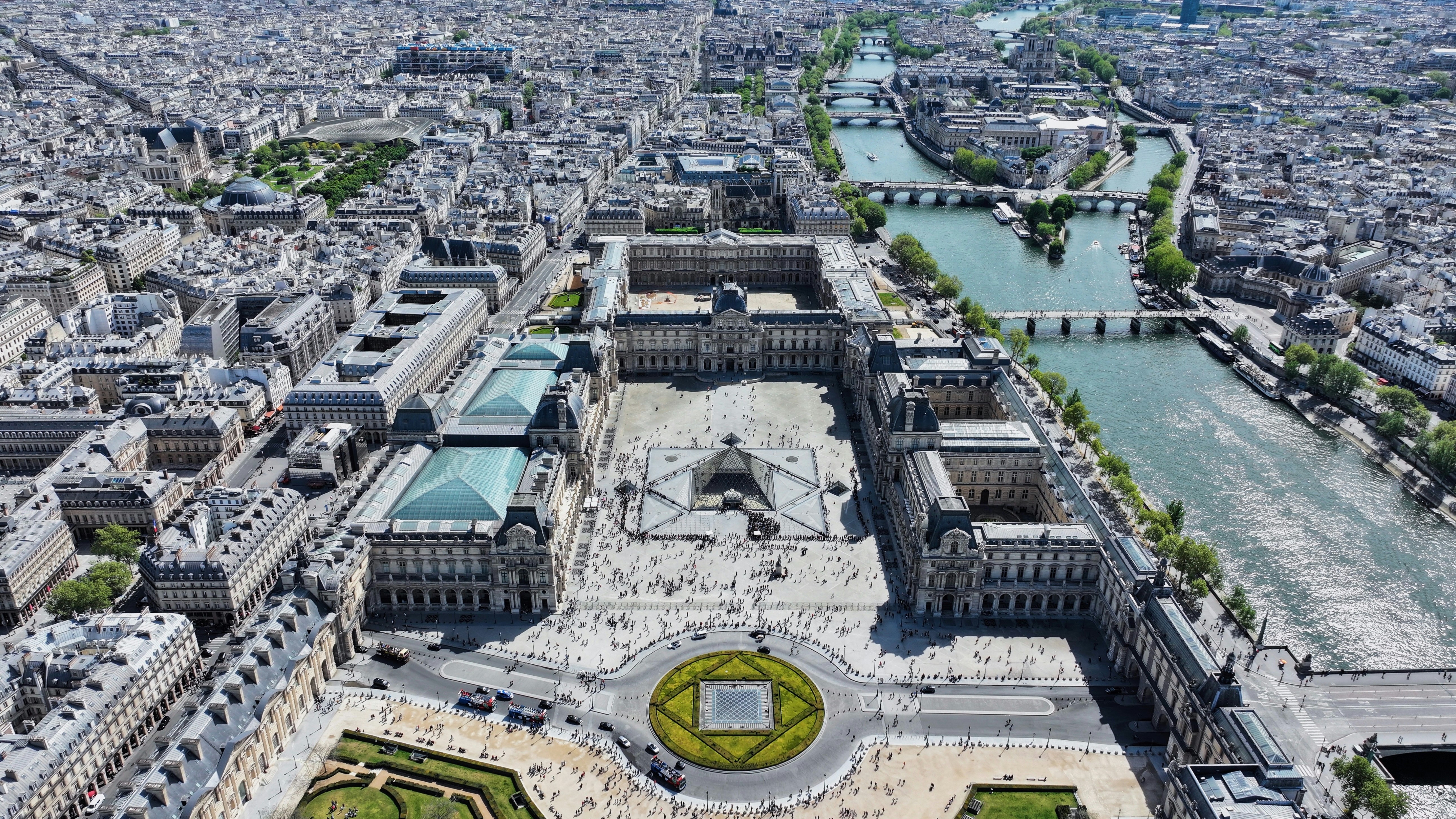 Aerial view of paris with a prominent building.