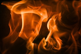 Flames are dancing in the burning fire.