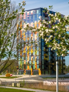 A colorful building stands in the sunny daylight.