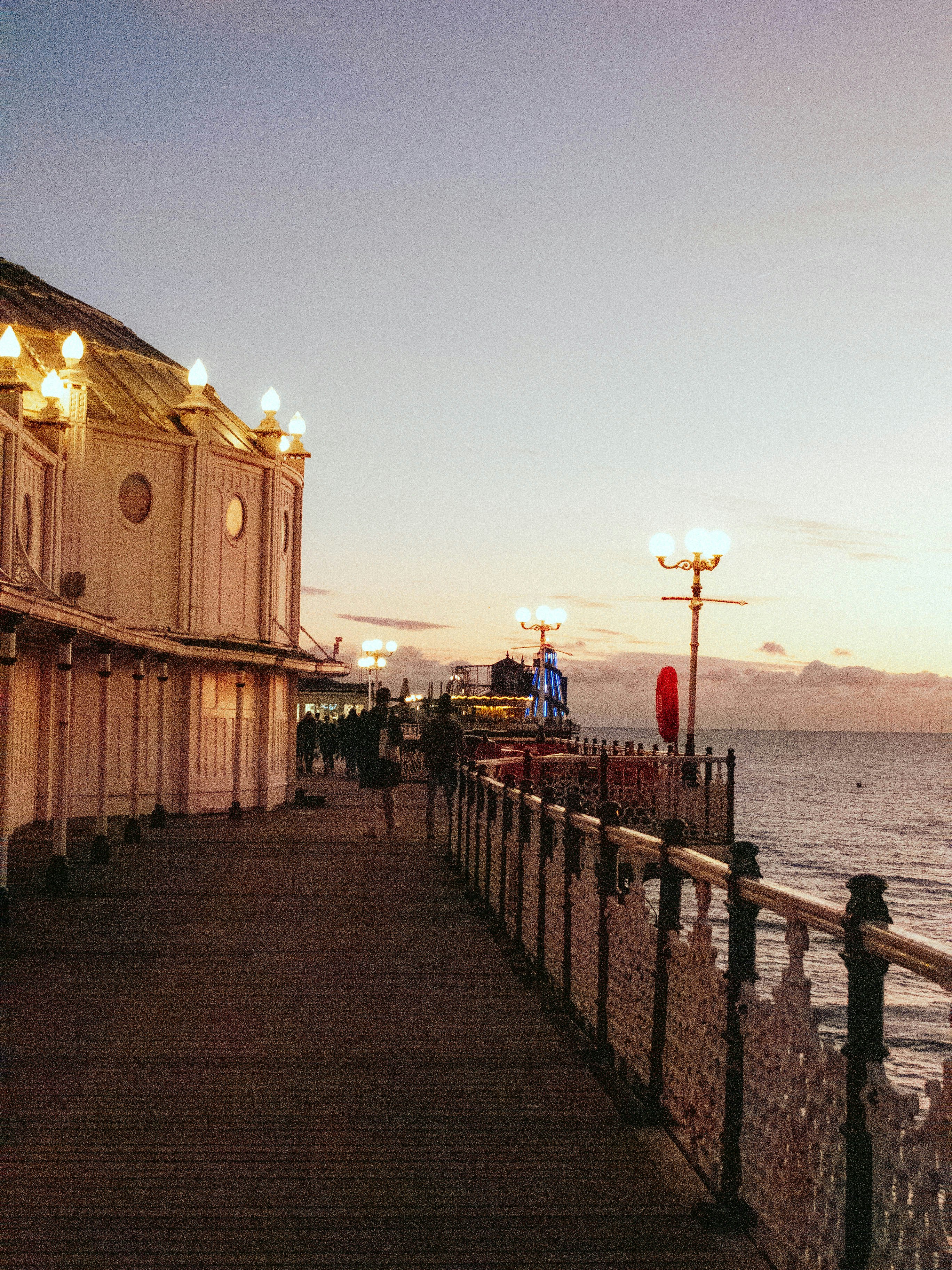 A pier at dusk with soft, warm lighting