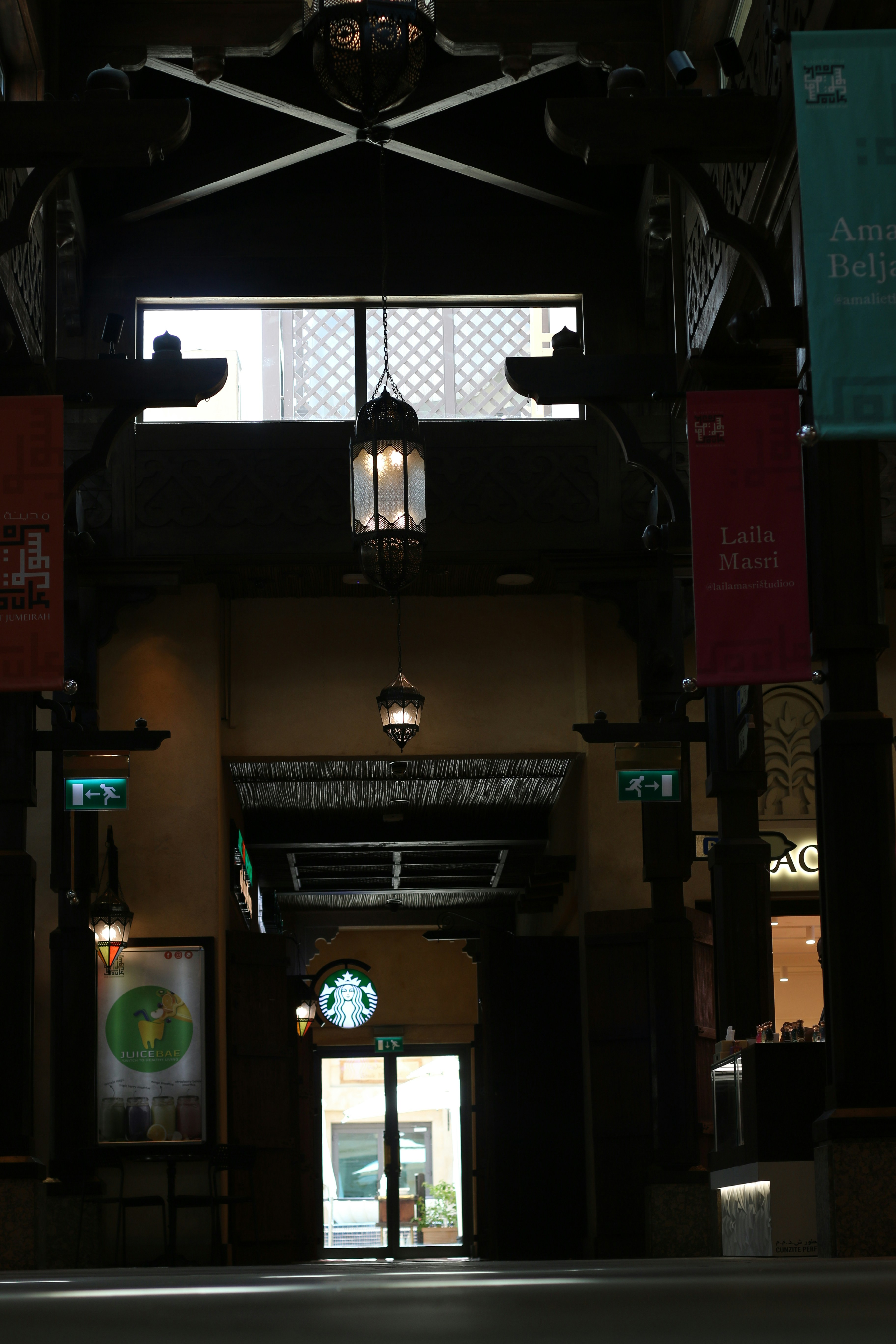 An ornate doorway leads to an entrance.