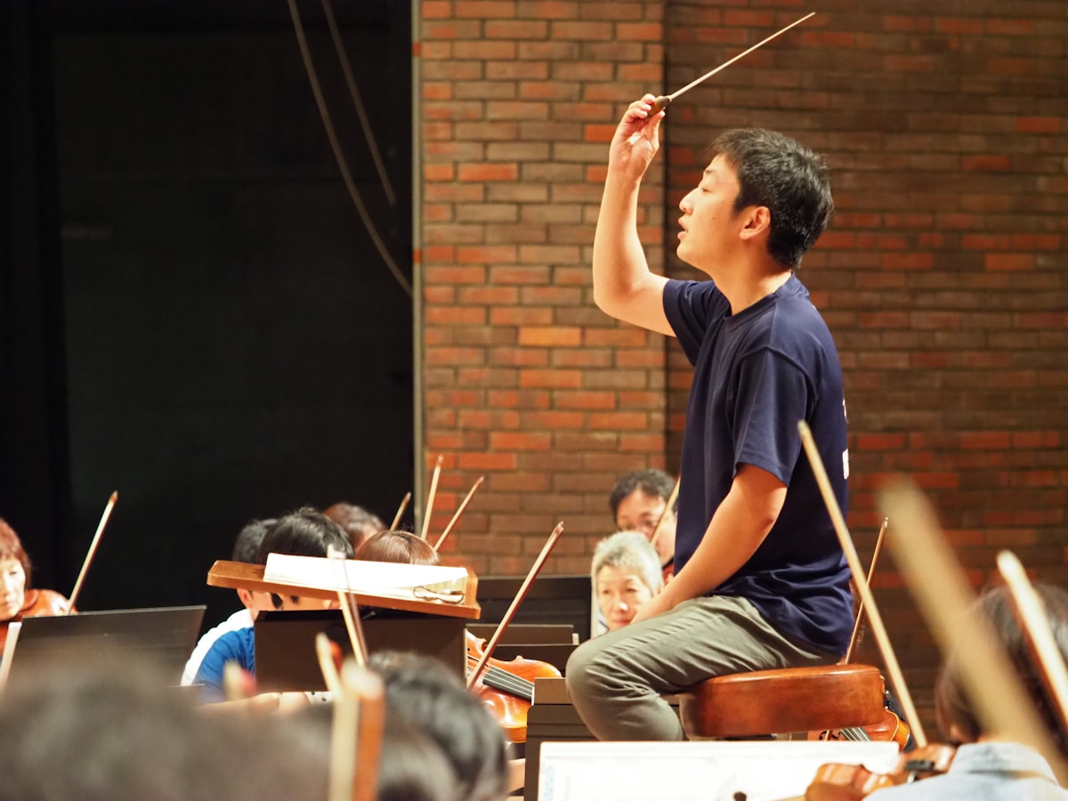 Full orchestra performing on stage