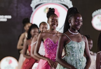 Beauty contestants walk onstage at a pageant.