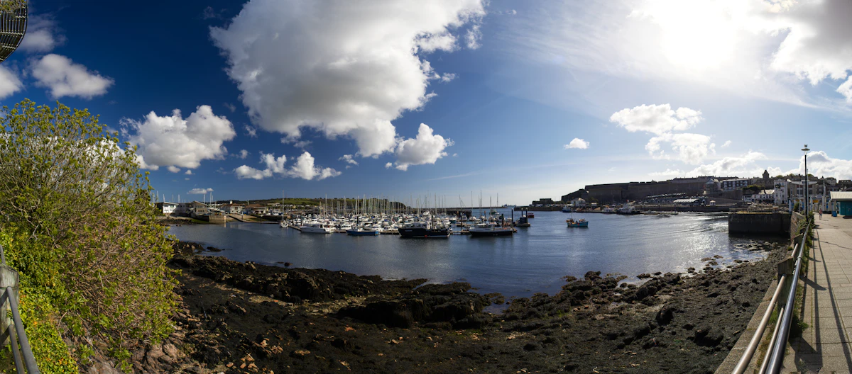 Wide sunny view across boats and Plymouth harbour