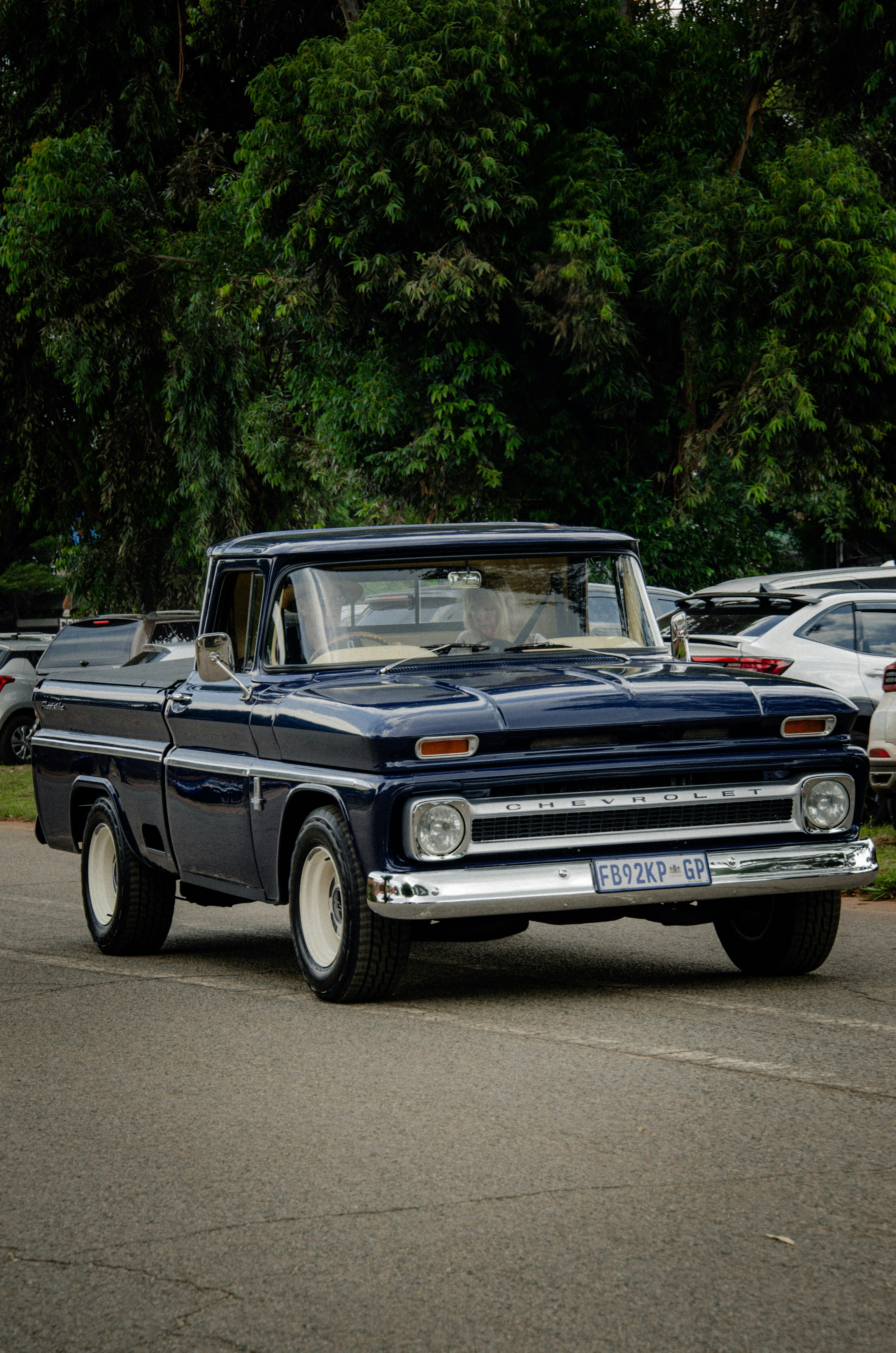 A classic blue chevrolet truck is shown in the image.