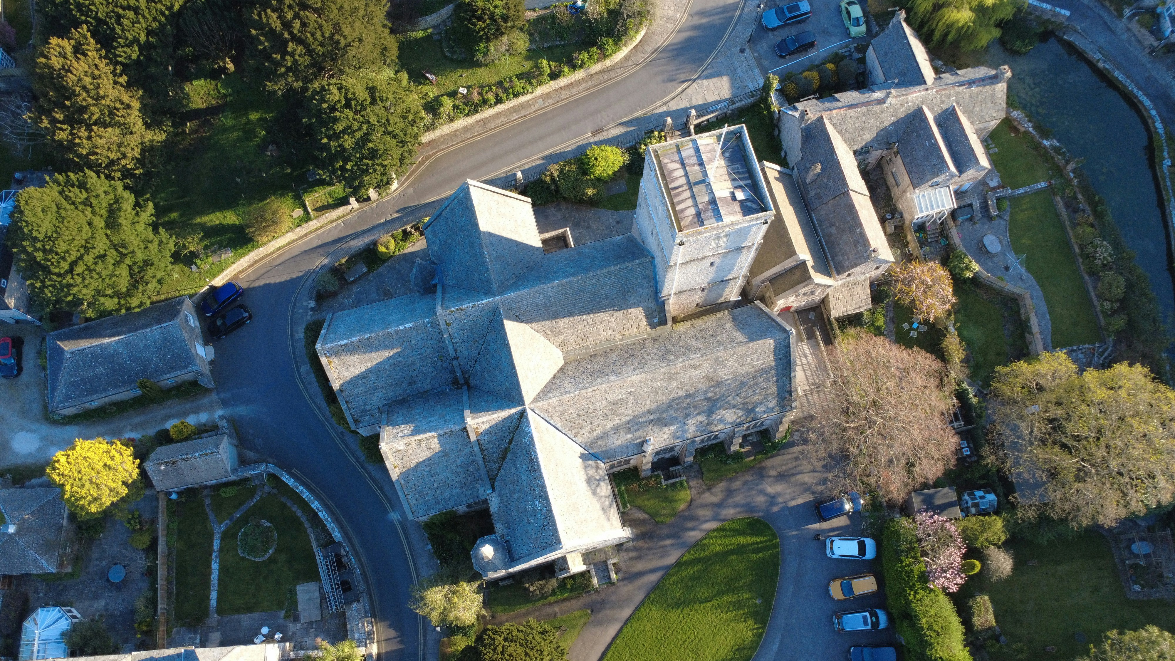 Aerial view of a traditional stone church.