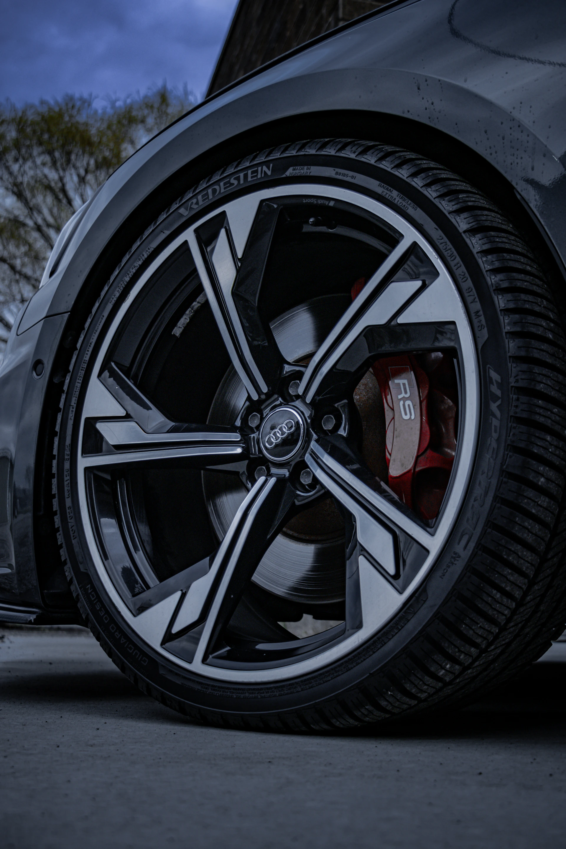 An audi wheel showing detail.