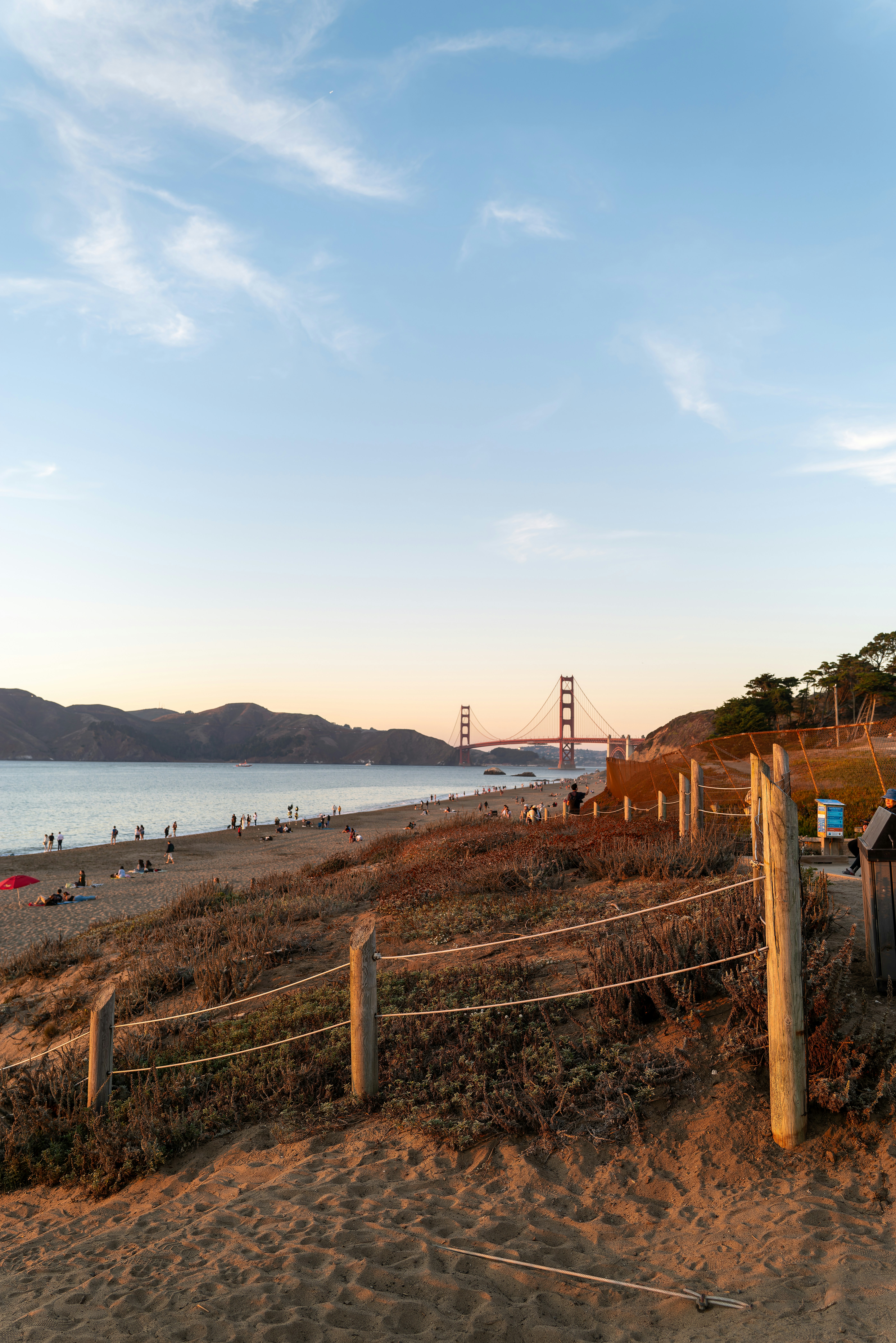 Golden gate bridge view from a sandy beach.