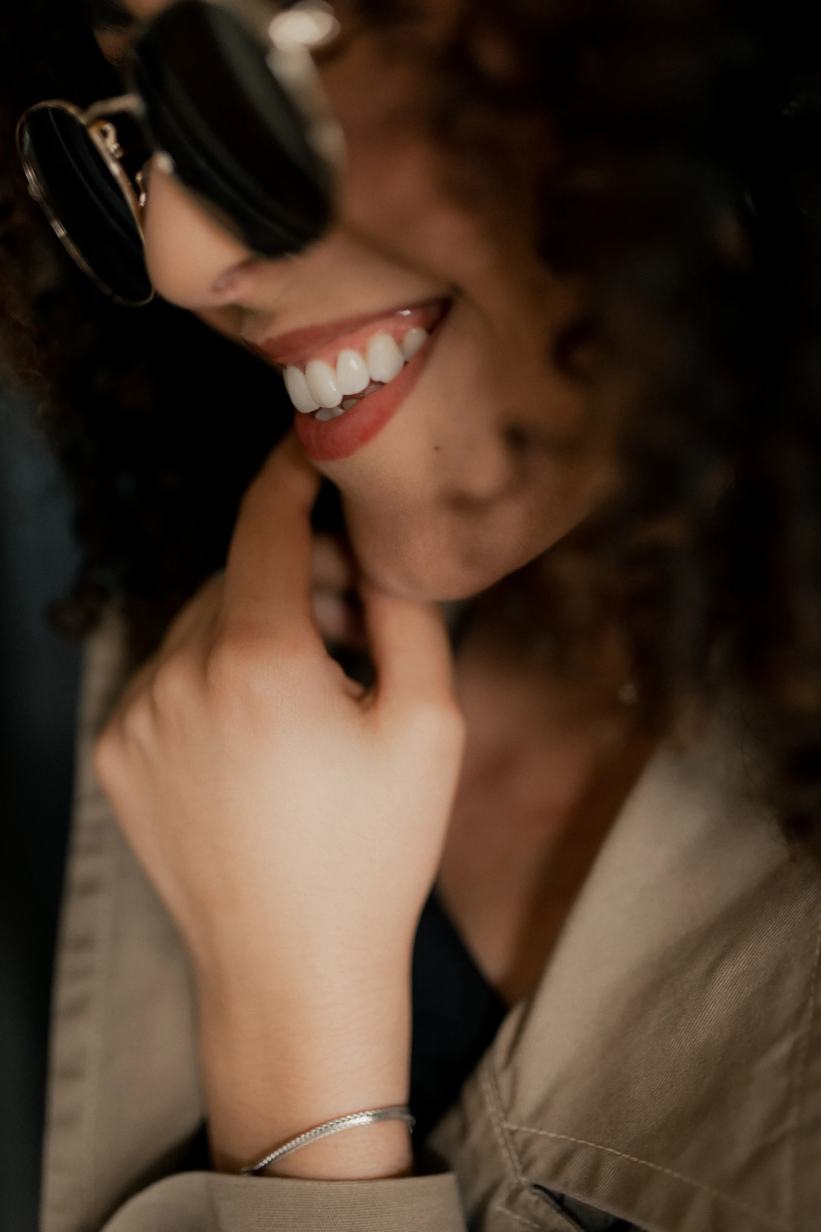 Woman smiling and showing bright natural teeth