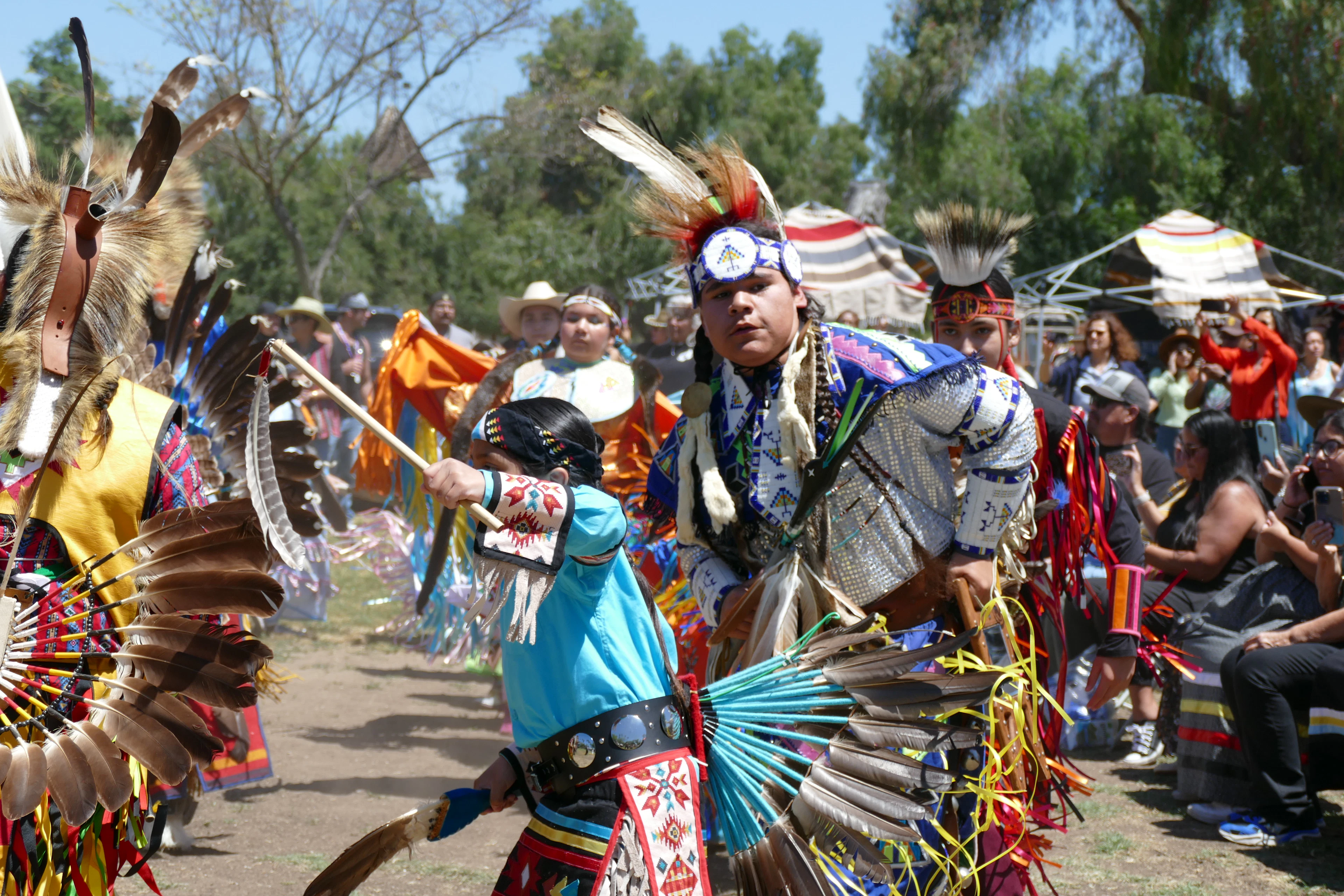 Indigenous people perform a vibrant traditional dance