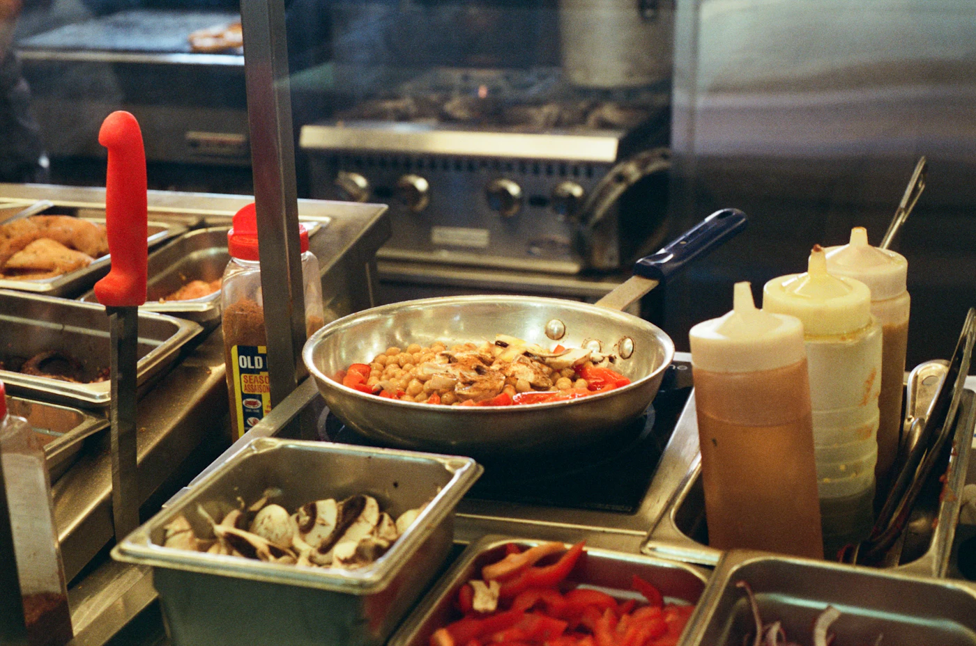 Gas cooking station representing burner and ignition servicing
