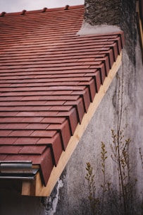Newly tiled roof with a gutter system.