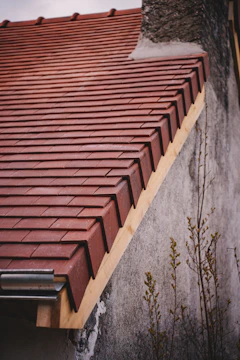Newly tiled roof with a gutter system.
