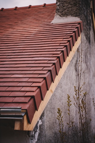 Newly tiled roof with a gutter system.