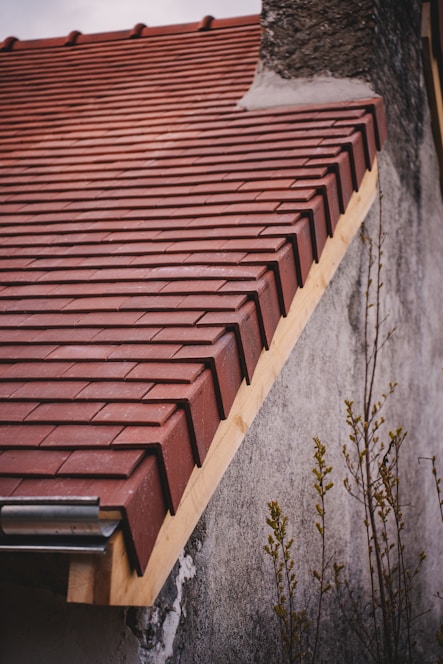 Newly tiled roof with a gutter system.