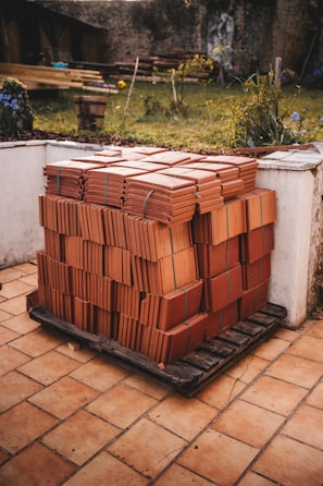 Tiles stacked on a pallet, ready for installation.