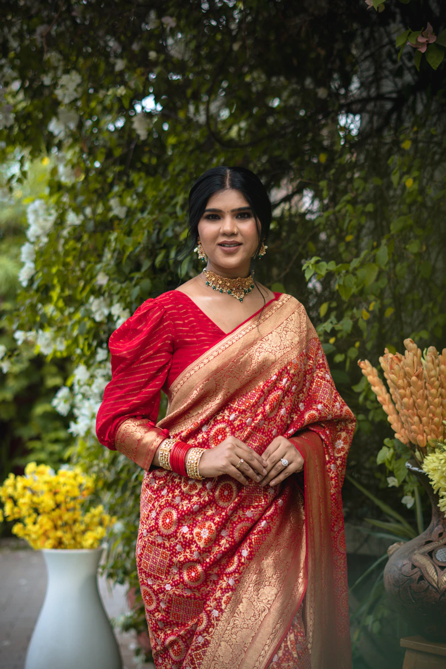 Festive Indian fashion — red and gold saree
