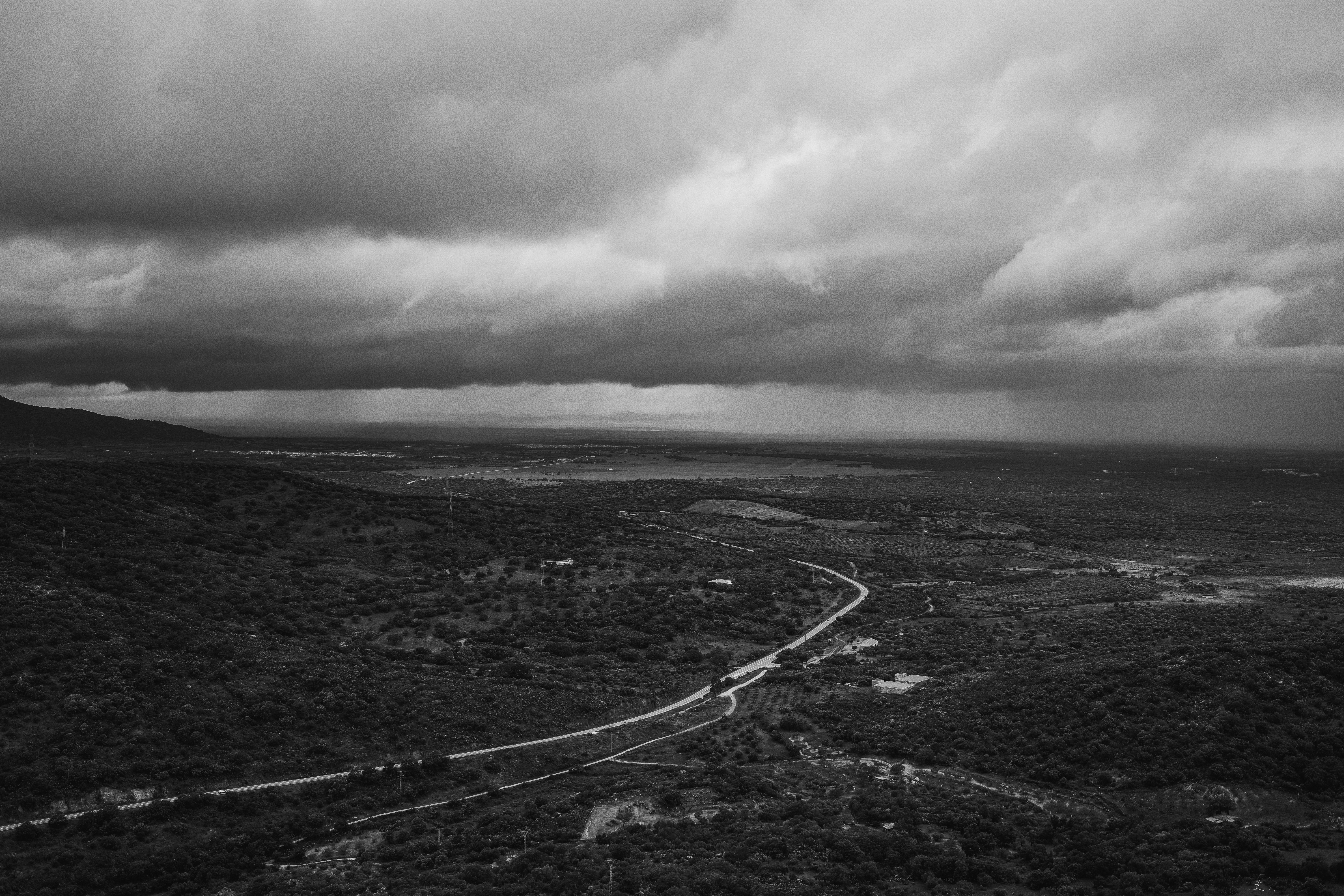 Overcast sky and rain over the dark landscape