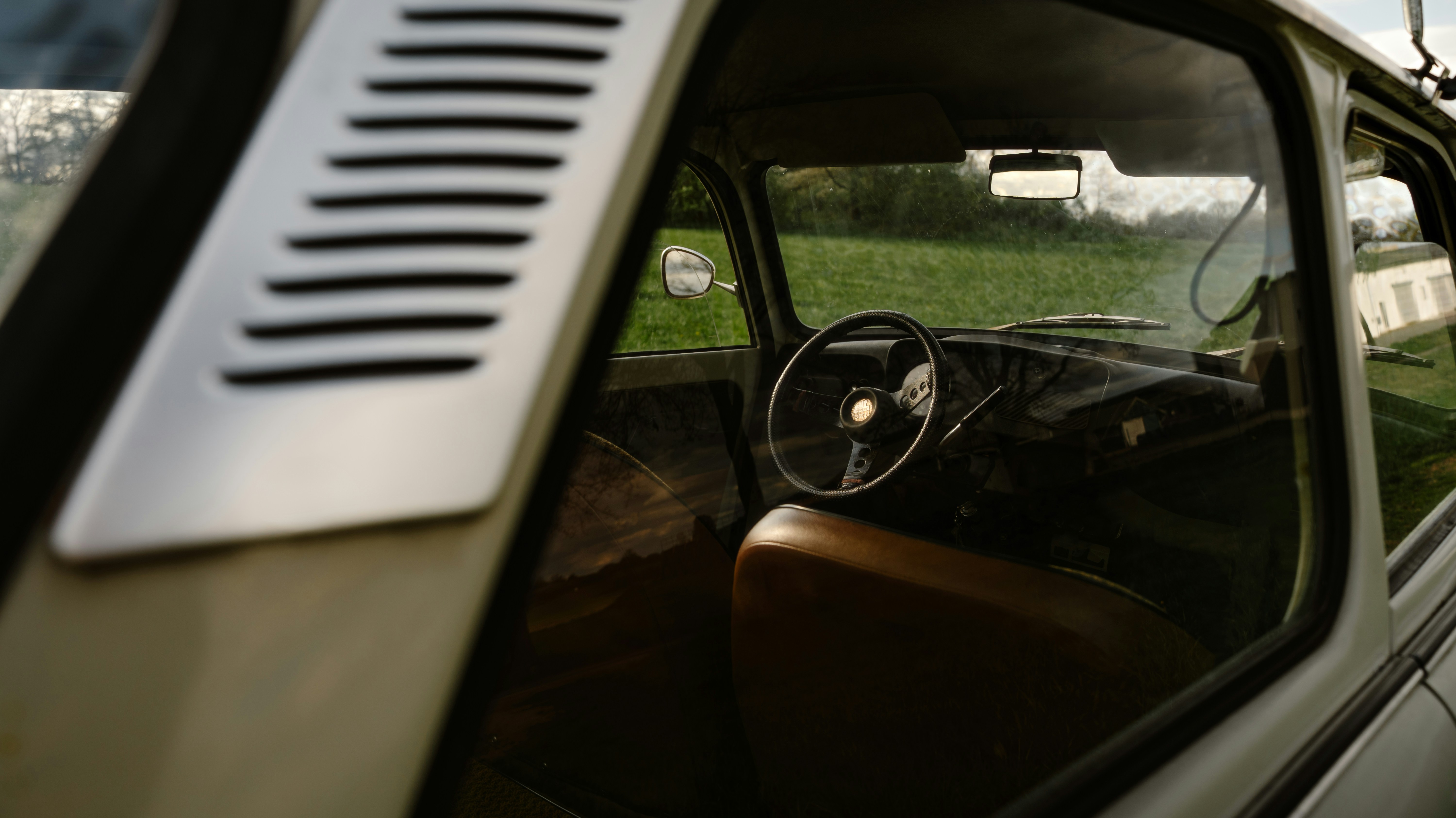 Interior view of a classic, vintage car.