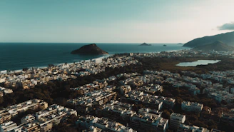 Aerial view of a city bordering the ocean