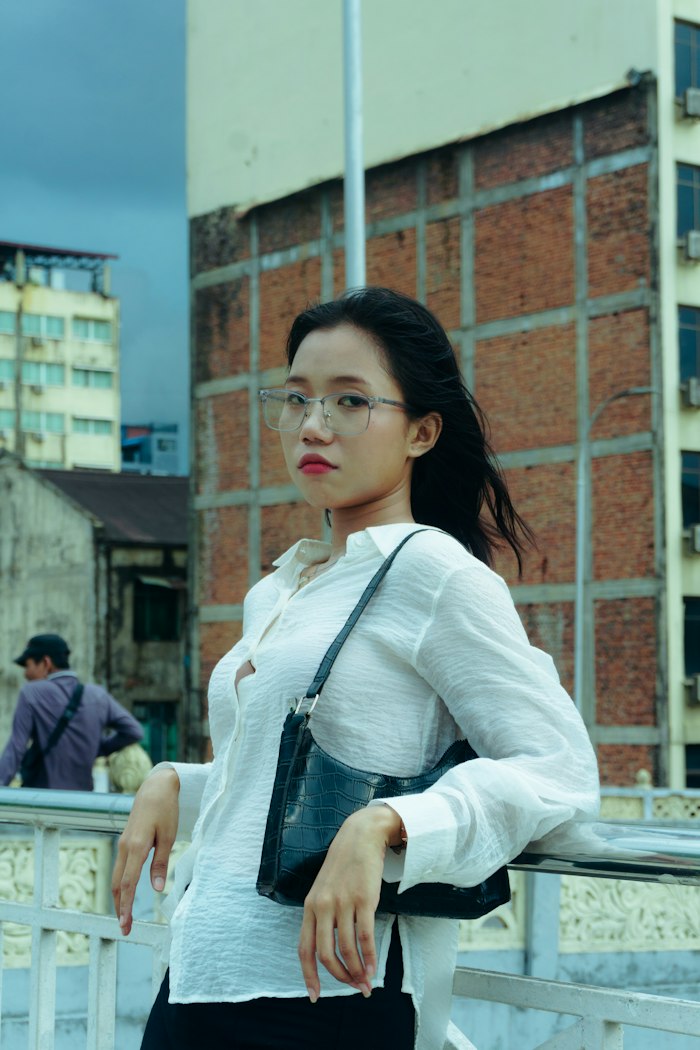 Free Myanmar dating site — woman from Yangon browsing AimerWorld profiles