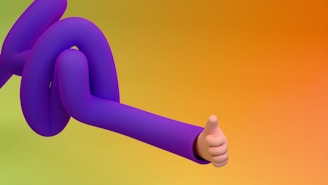 A purple arm gives a thumbs up.
