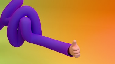 A purple arm gives a thumbs up.