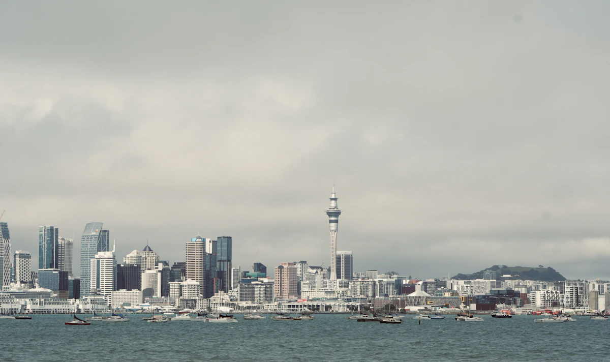 Auckland skyline rising beside Waitematā Harbour