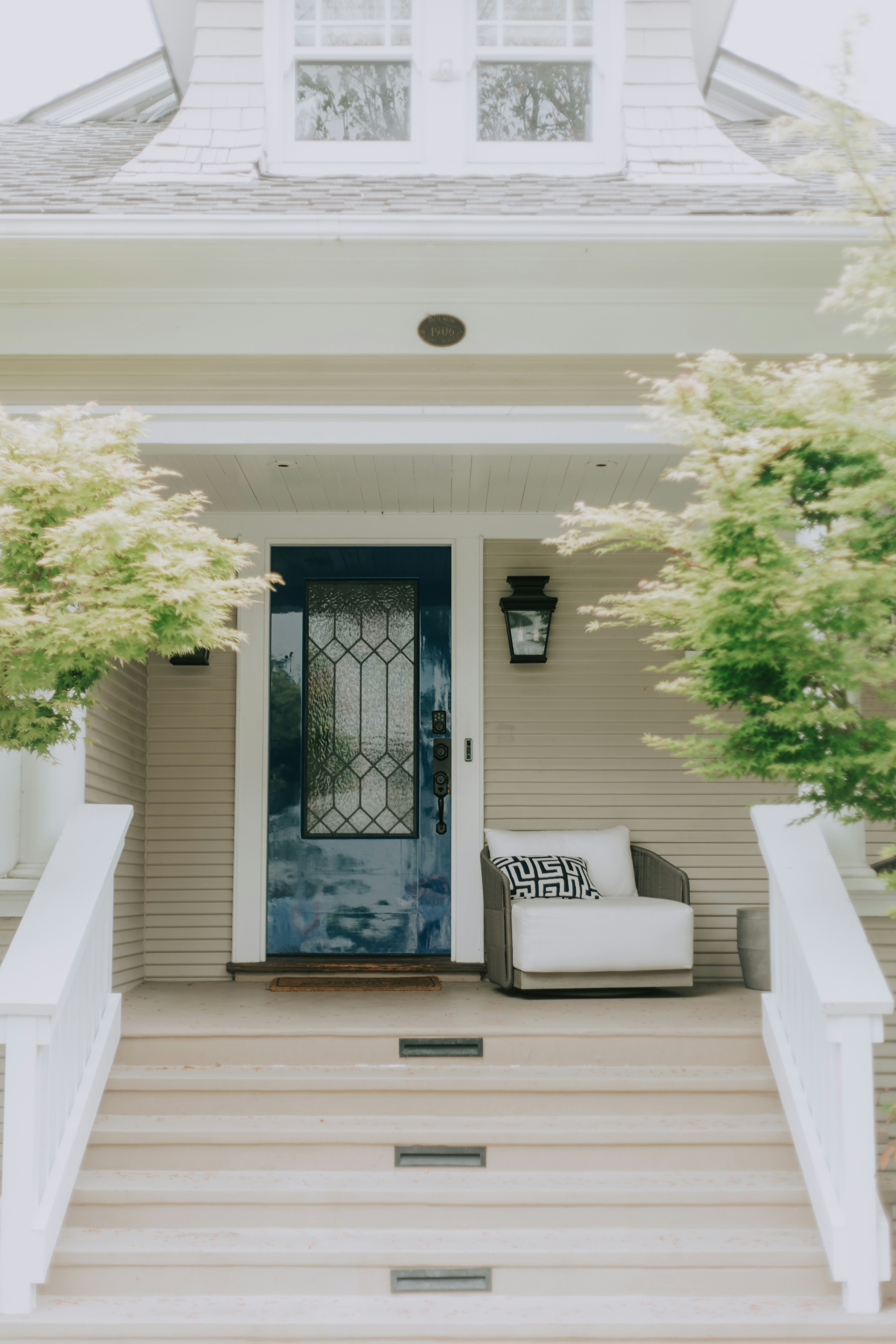 A beautiful house entrance with porch and door.