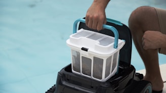 Routine pool cleaning step during weekly service in Central Texas.