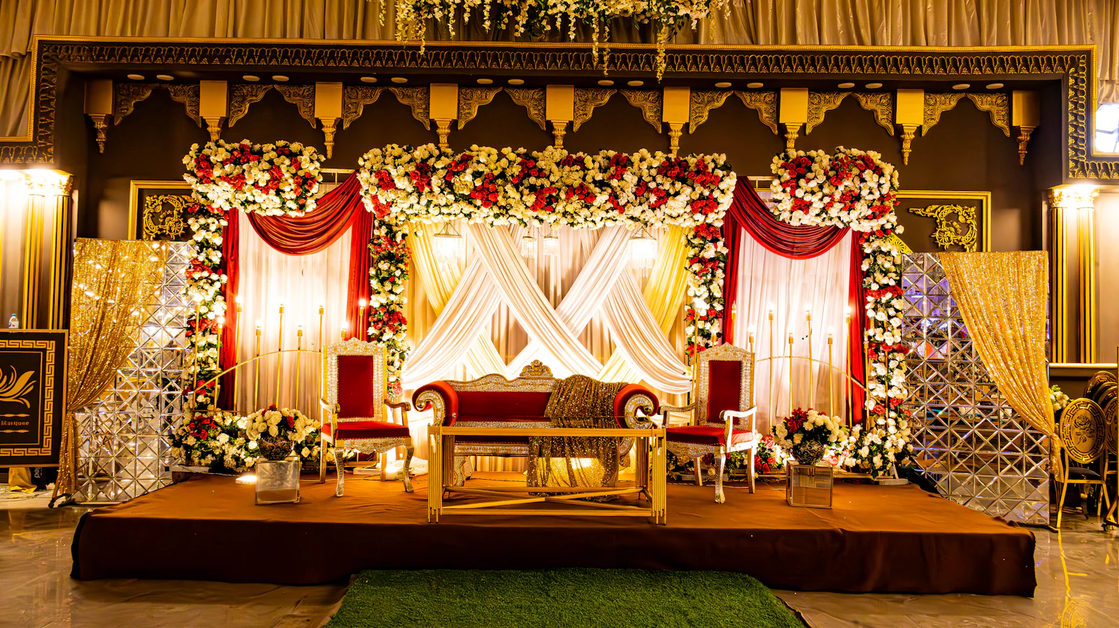 Decorated stage prepared for a sangeet celebration