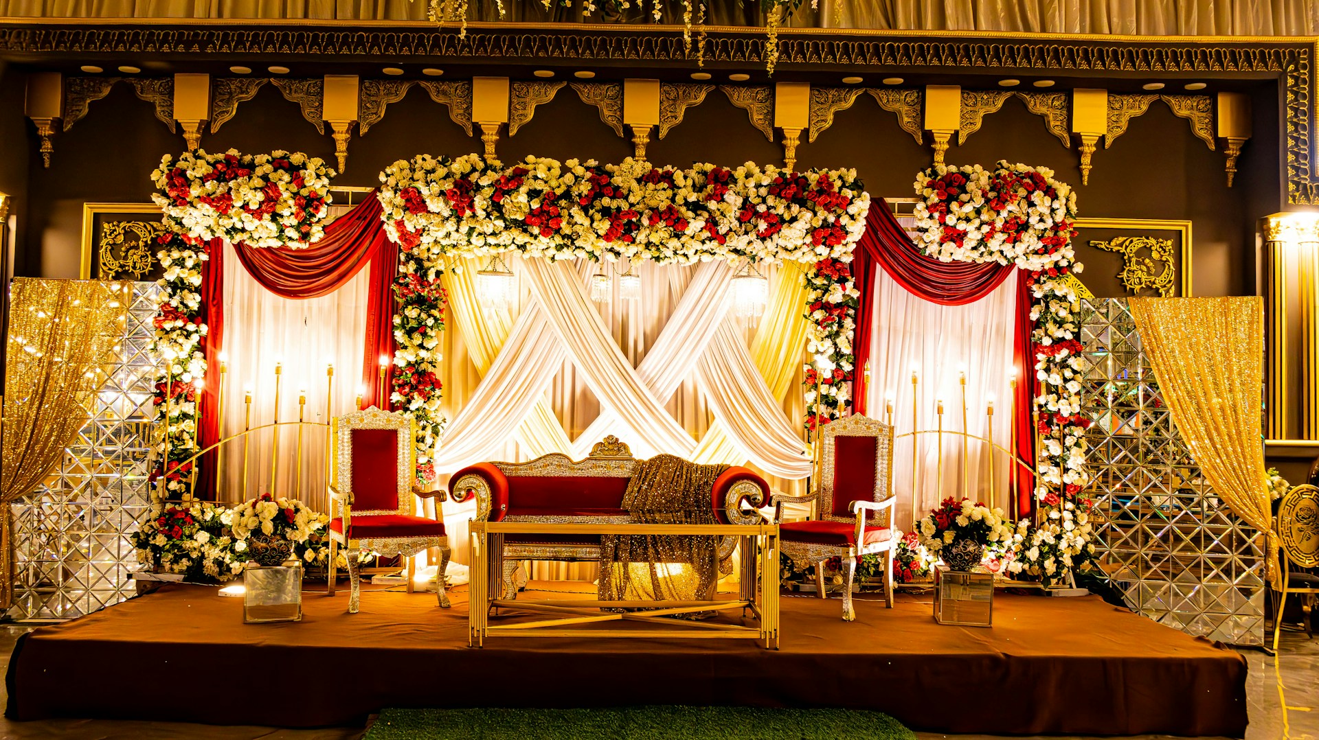A beautifully decorated stage for a wedding ceremony.