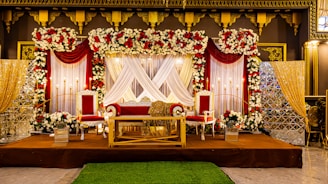 A beautifully decorated stage ready for a ceremony.