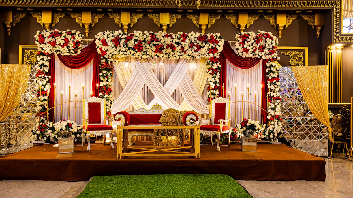 A beautifully decorated stage ready for a ceremony.
