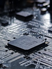 A detailed close-up of a computer motherboard.